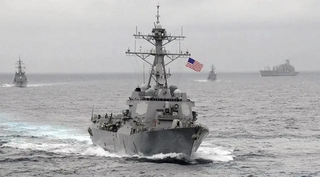 美国航母进入南海与中国的应对策略，为何中国不开炮？，美国航母南海行动与中国的应对策略，为何中国选择和平应对？